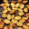 Greek style potatoes in a pan