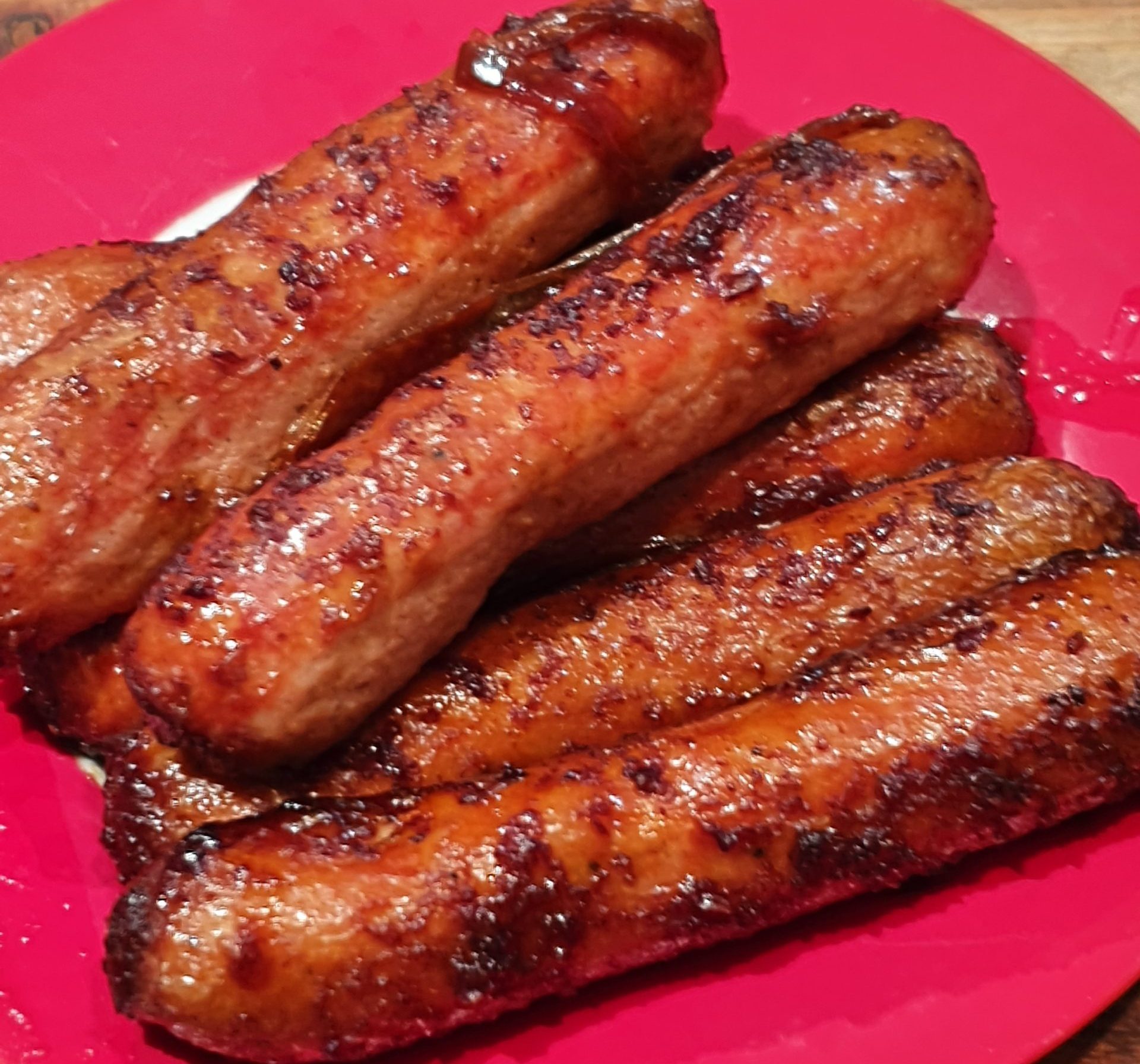 Barbecued honey and soy sausages