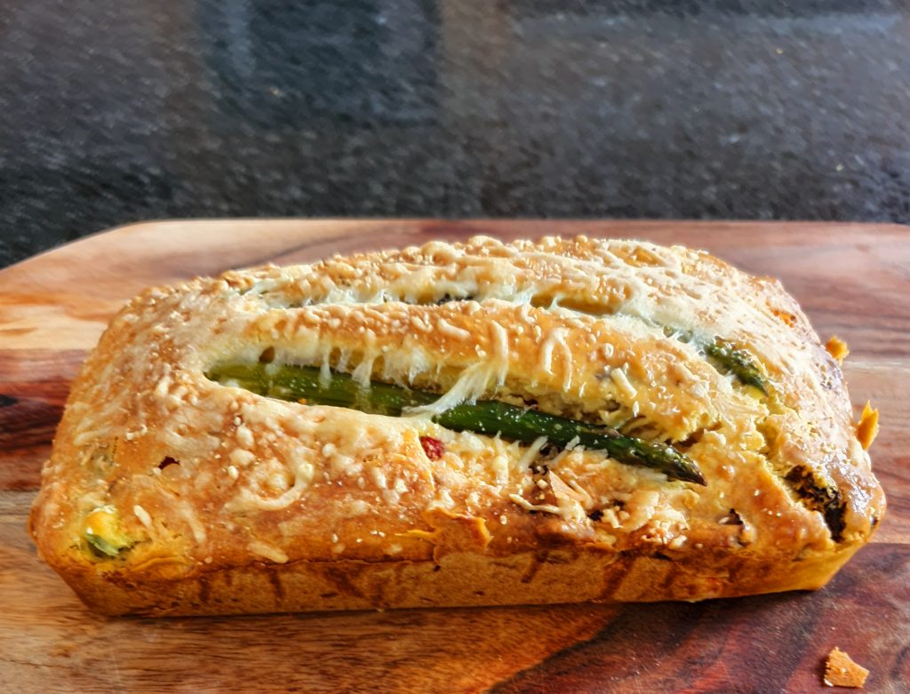 olive loaf on a breadboard